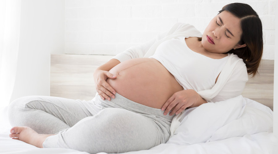 femme enceinte contraction